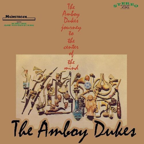 Album cover for 'The Amboy Dukes - Journey To The Center Of The Mind' featuring a collage of musical instruments and other items, with the band's name at the bottom.