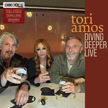 Album cover for 'Diving Deeper Live' by Tori Amos featuring three people at a table with drinks.