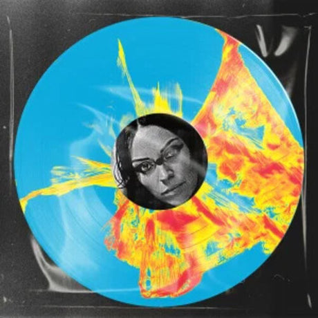 Vinyl record with a colorful abstract design and a portrait in the center.