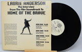 Vinyl record with cover featuring Laurie Anderson's 'The Interview' from 'Home of the Brave'.