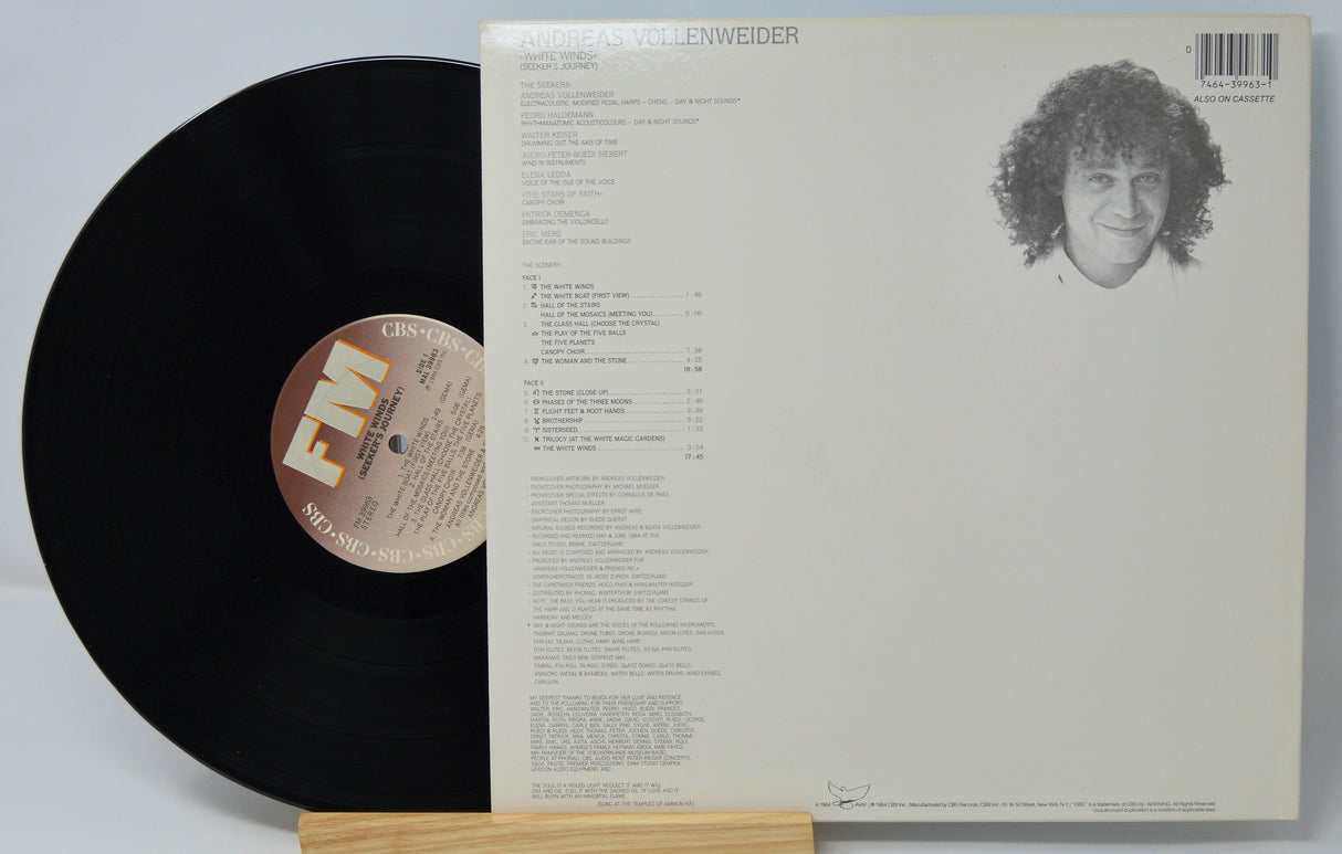 Vinyl record with cover featuring a person's face and text