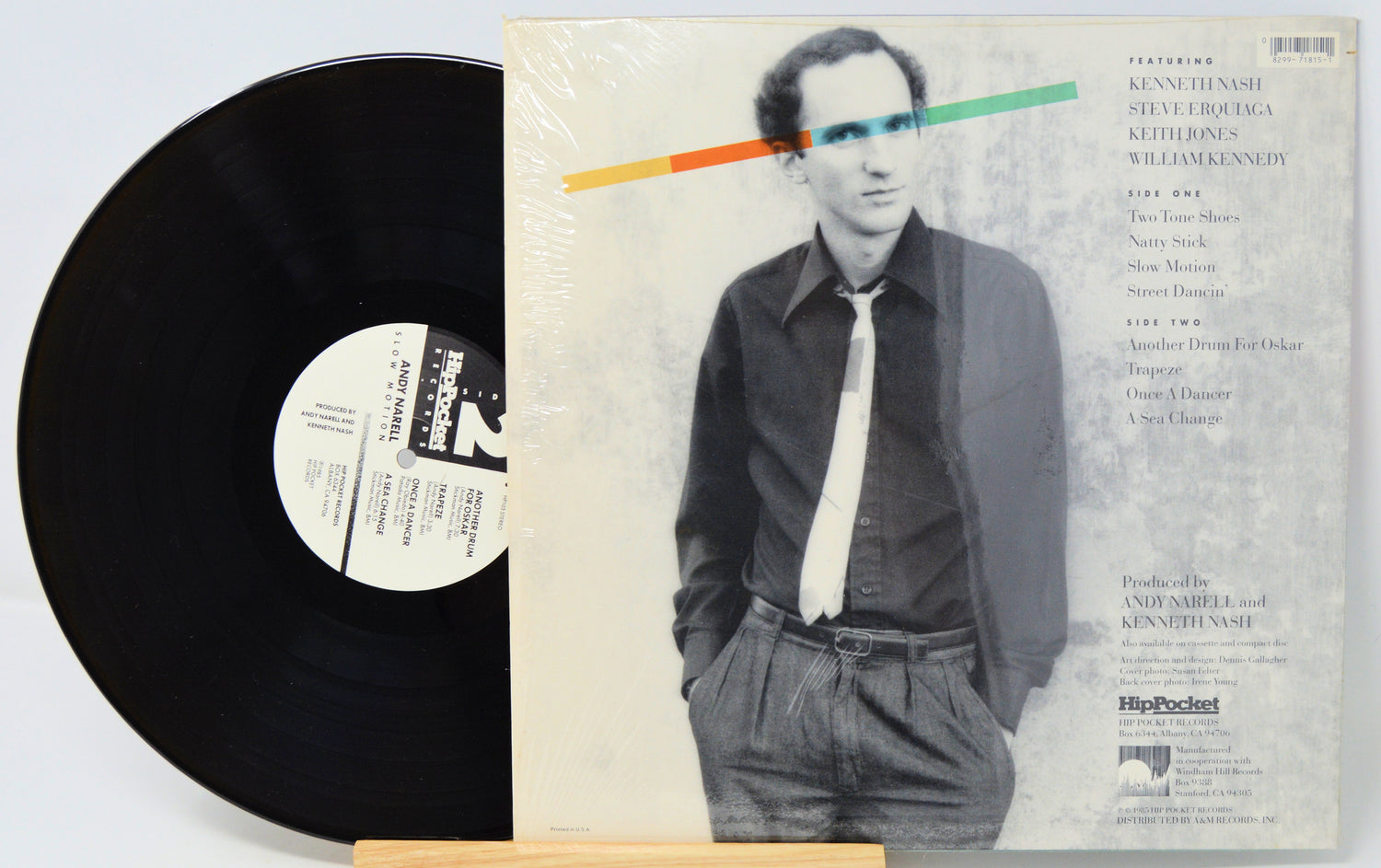 Vinyl record with a person on the cover and a white background