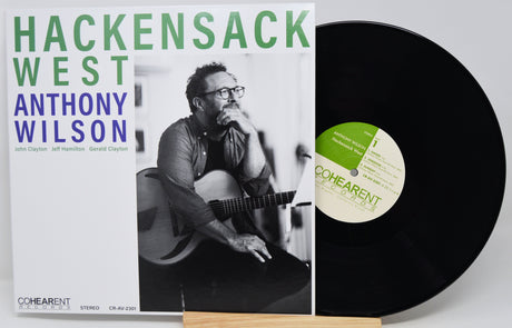 Vinyl record album cover for 'Hackensack West' by Anthony Wilson, shown with the black LP partially pulled out and a Cohearent label visible, on a light gray background.
