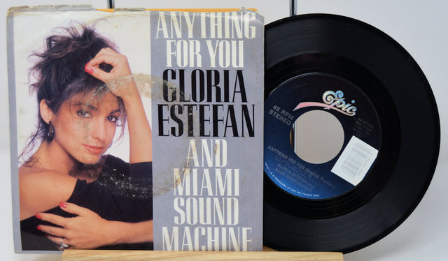 Front cover of 'Anything For You' vinyl single by Gloria Estefan and Miami Sound Machine, with vinyl record