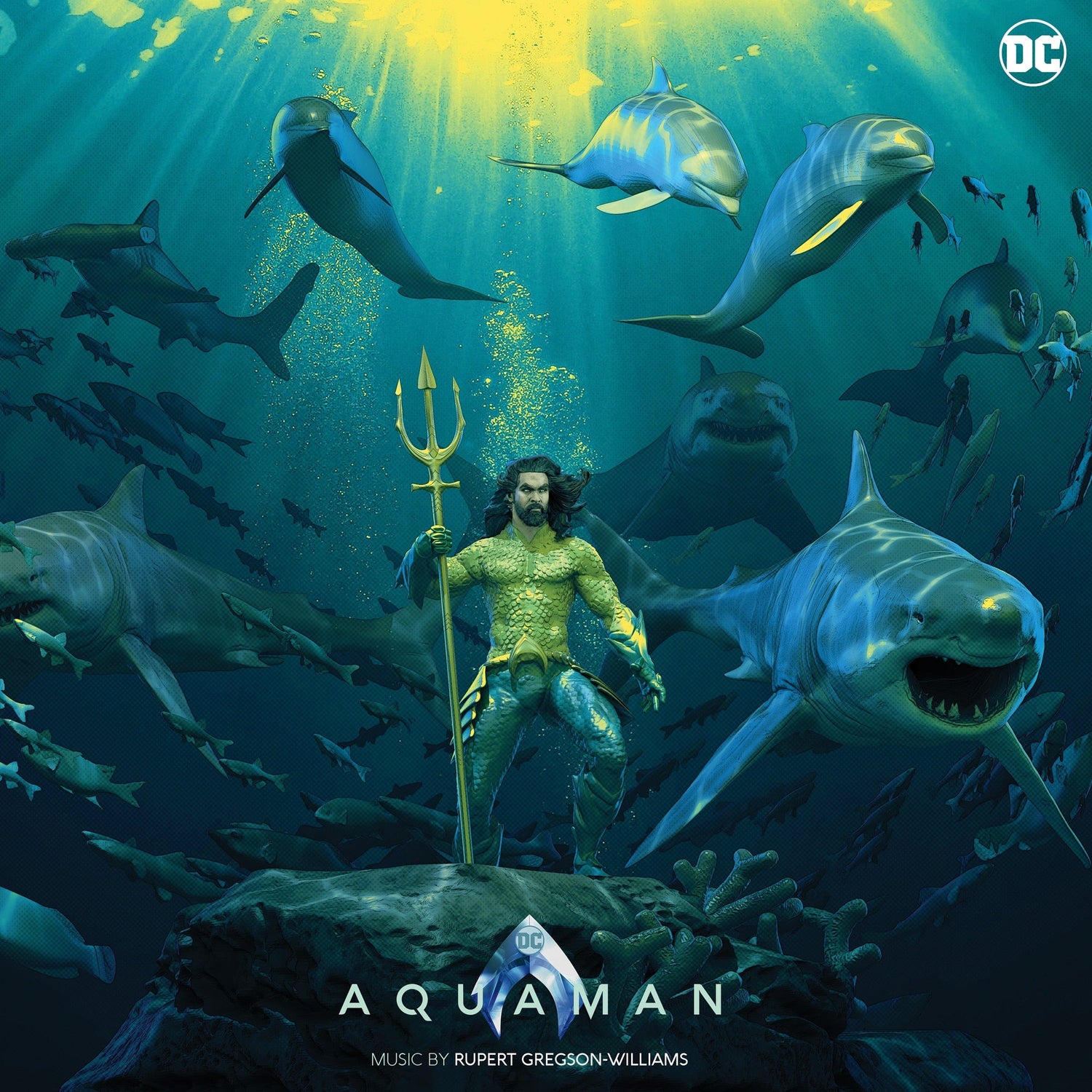 Cover art for 'Aquaman - Soundtrack Deluxe' featuring a stylized image of the character Aquaman fighting a shark in a vibrant underwater setting, with the DC logo and the movie title 'Aquaman' prominently displayed.