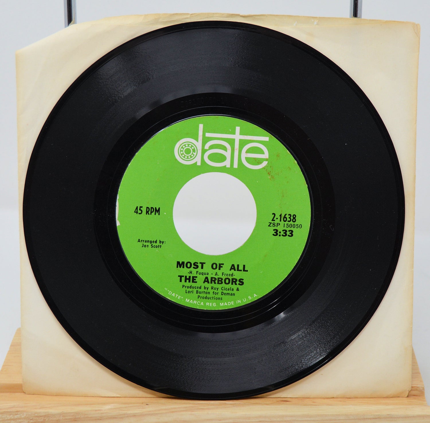 A vinyl record of The Arbors, titled 'The Letter', with a green and white label on a white background.
