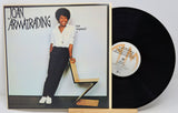 A used vinyl record of Joan Armatrading's album 'Me Myself I' with the artist's photo on the cover, displayed next to the vinyl.