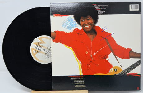 Vinyl record album by Joan Armatrading titled 'The Key' with a colorful cover artwork featuring a stylized image of Joan Armatrading.