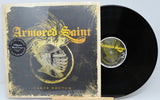 Vinyl record and cover with 'Armored Saint' branding on a light gray background