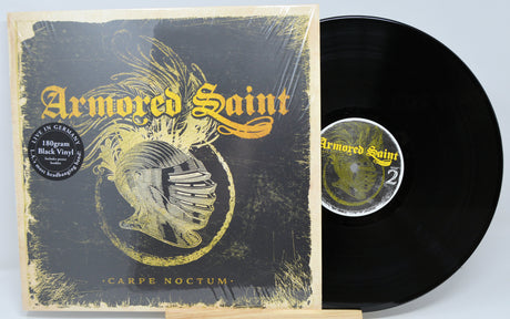 Vinyl record and cover with 'Armored Saint' branding on a light gray background