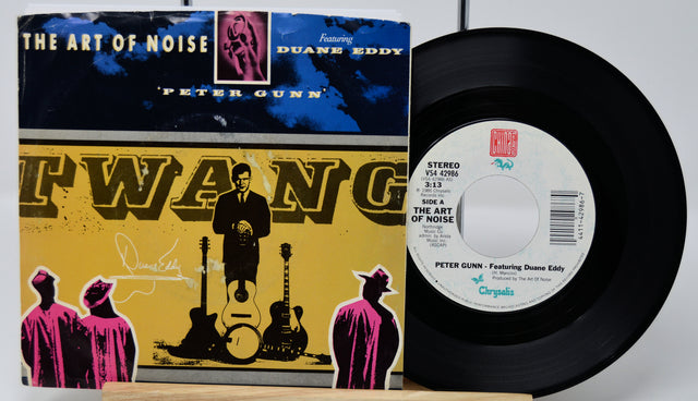 Vinyl record and cover with 'The Art of Noise' and 'Peter Gunn' by Duane Eddy