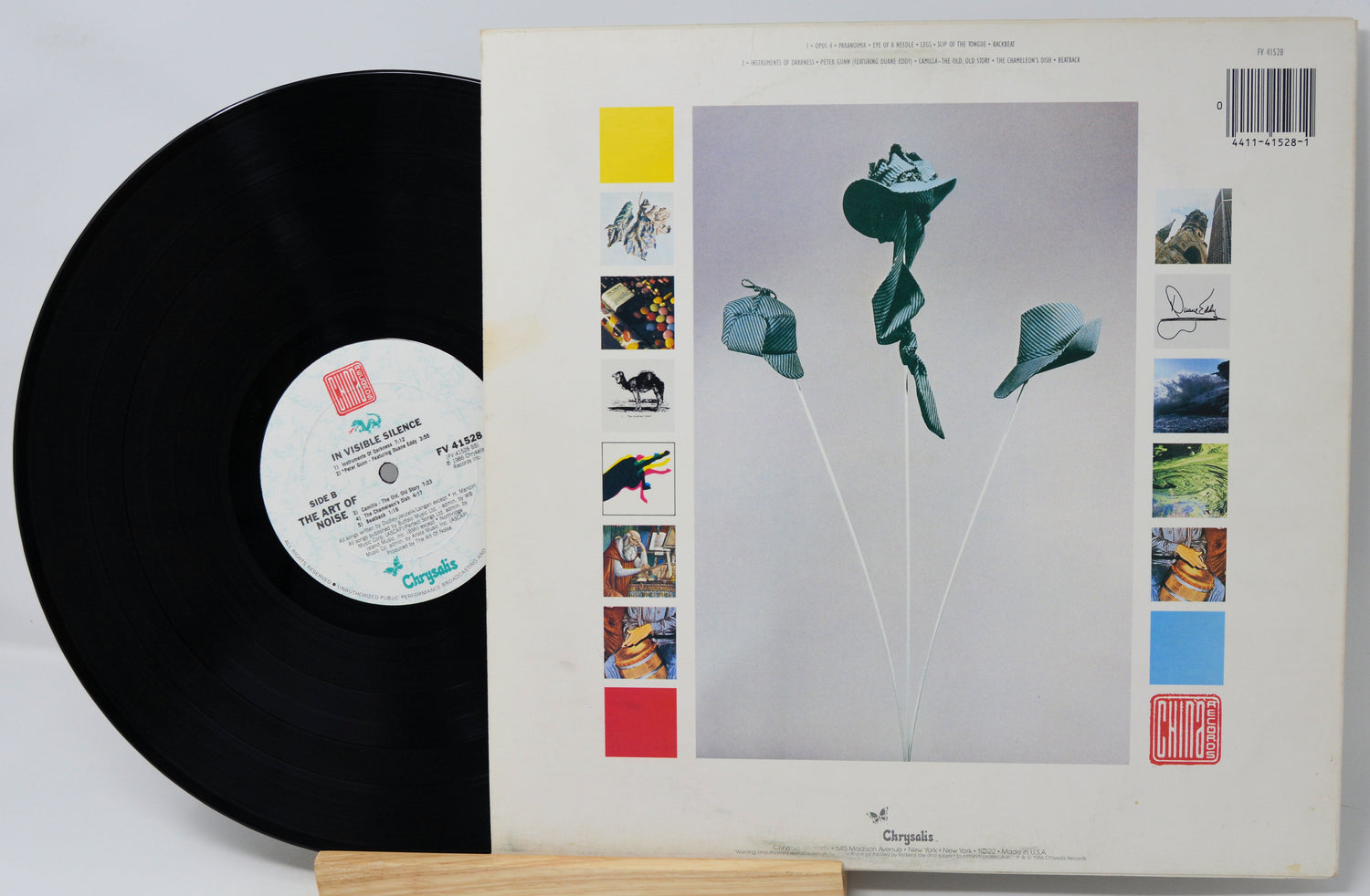 Vinyl record with a colorful cover featuring abstract art and text.