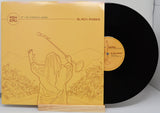 Front cover of Asheru's Black Moses 12-inch vinyl with stylized line art of Moses and crowd