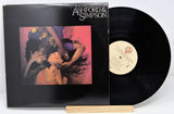 Used vinyl record of Ashford & Simpson with a label showing the title 'Is It Still Good To Ya' and an image of a couple embracing.