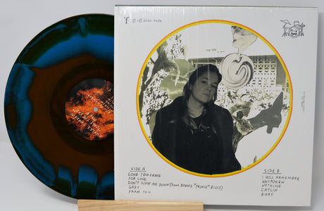 Front and back cover of Ashley Shadow's 'Only The End' limited edition blue and orange swirl vinyl LP