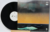 Vinyl record with cover featuring a gradient design and text