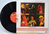 Vinyl record 'Atlanta Rhythm Section - Red Tape' with a colorful cover featuring portraits of band members on a light blue background.