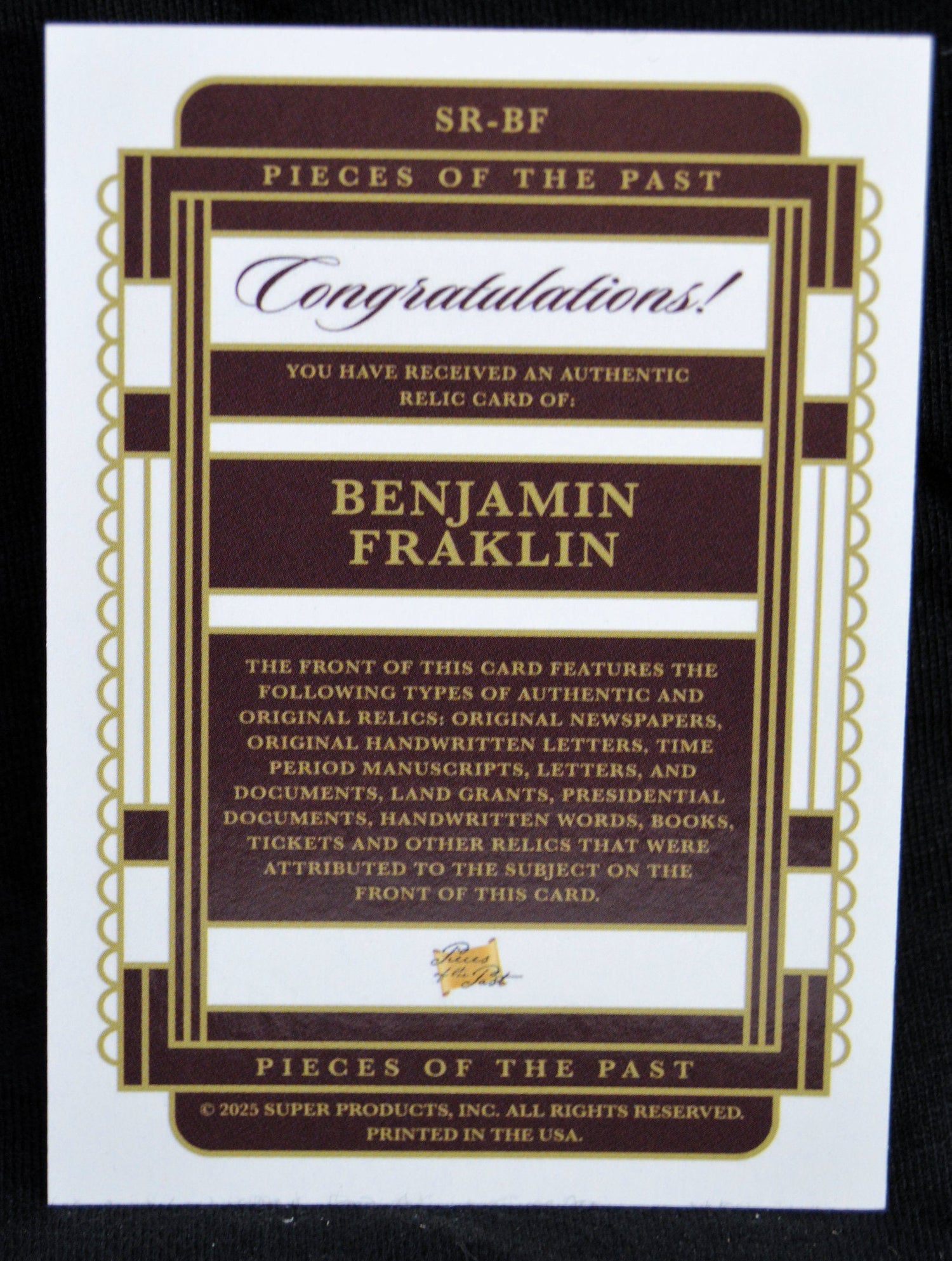 Back of Benjamin Franklin relic card detailing authenticity and relic types