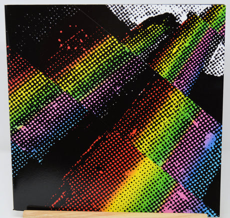 Colorful abstract design with rainbow patterns on a black background