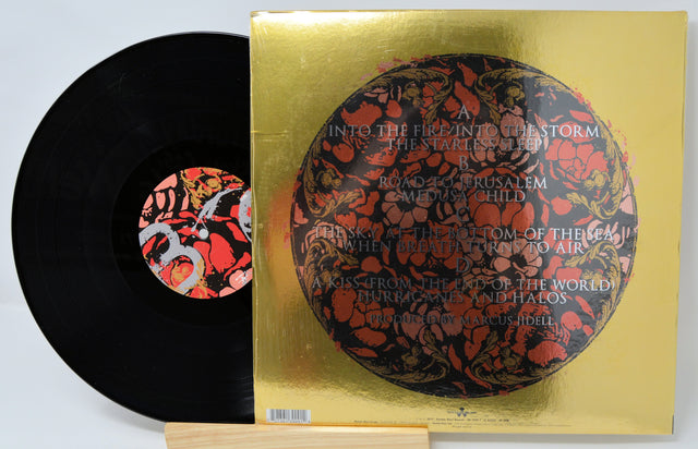 Back cover of Avatarium Hurricanes and Halos LP with gold foil artwork and tracklist