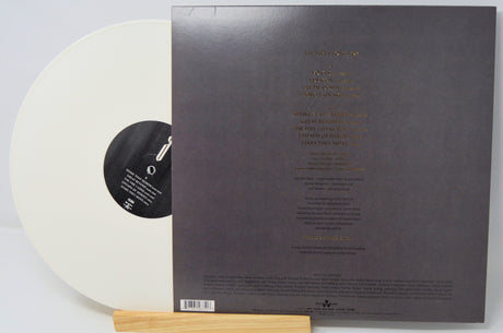 Back cover and white vinyl record of Avatarium's 'The Fire I Long For' LP with tracklist and information