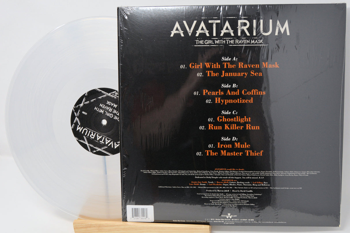 Back cover of Avatarium's The Girl With The Raven Mask clear vinyl LP showing tracklist