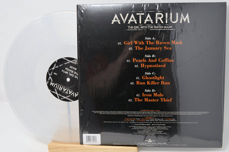 Back cover of Avatarium's The Girl With The Raven Mask clear vinyl LP showing tracklist