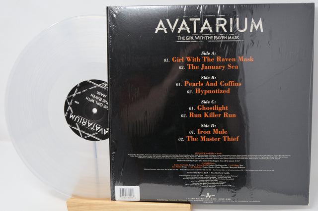 Back cover of Avatarium's The Girl With The Raven Mask clear vinyl LP showing tracklist