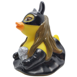 Rubber duck dressed as a superhero with a mask, cape, and cape emblem on a white background