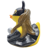 Rubber duck with long hair and black outfit on a white background