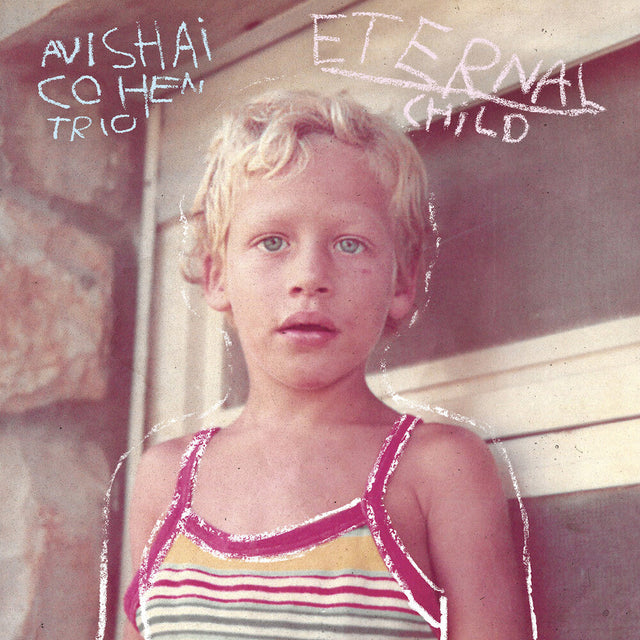 Album cover with a child sitting on a bench, text 'Avishai Cohen Trio Eternal Child'.