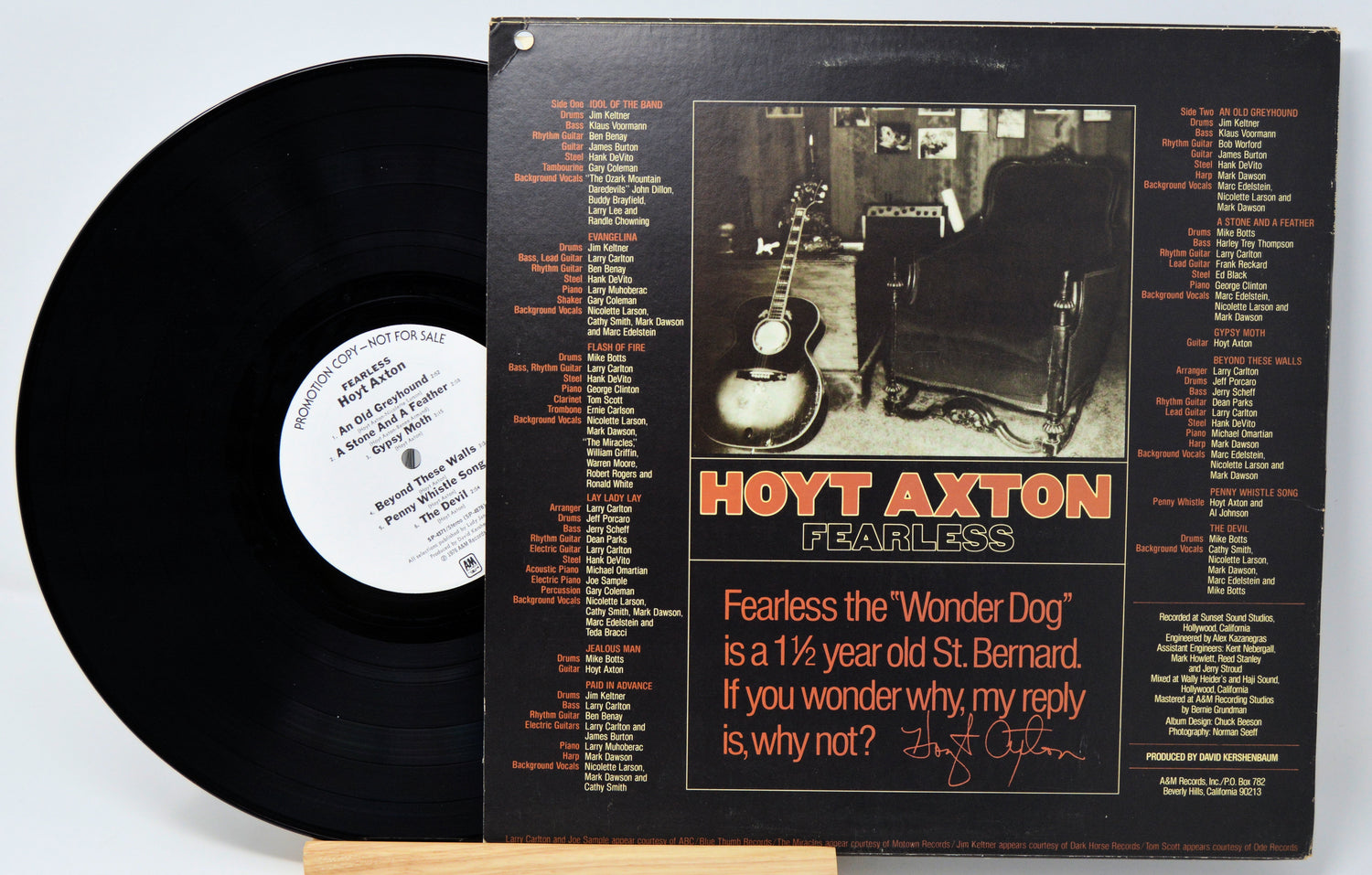 A vinyl record titled 'Hoyt Axton - Fearless' with the artist's image on the cover.
