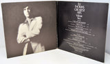 Album cover for B.J. Thomas' 'Greatest Hits Volume Two' with a portrait on the left and tracklist on the right.