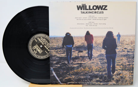The Willowz Talkin' Circles vinyl record cover back with track listing and band members walking in a field