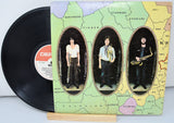 Back cover of The Battle of North West Six vinyl showing band portraits on a colorful London map background