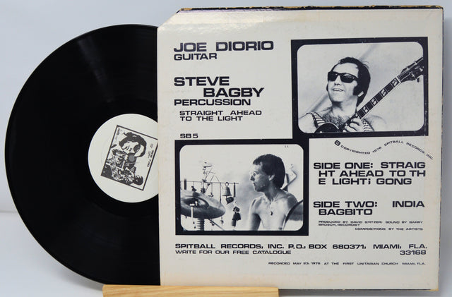 Back cover and vinyl record of Joe Diorio and Steve Bagby's 1976 jazz LP Straight Ahead to the Light