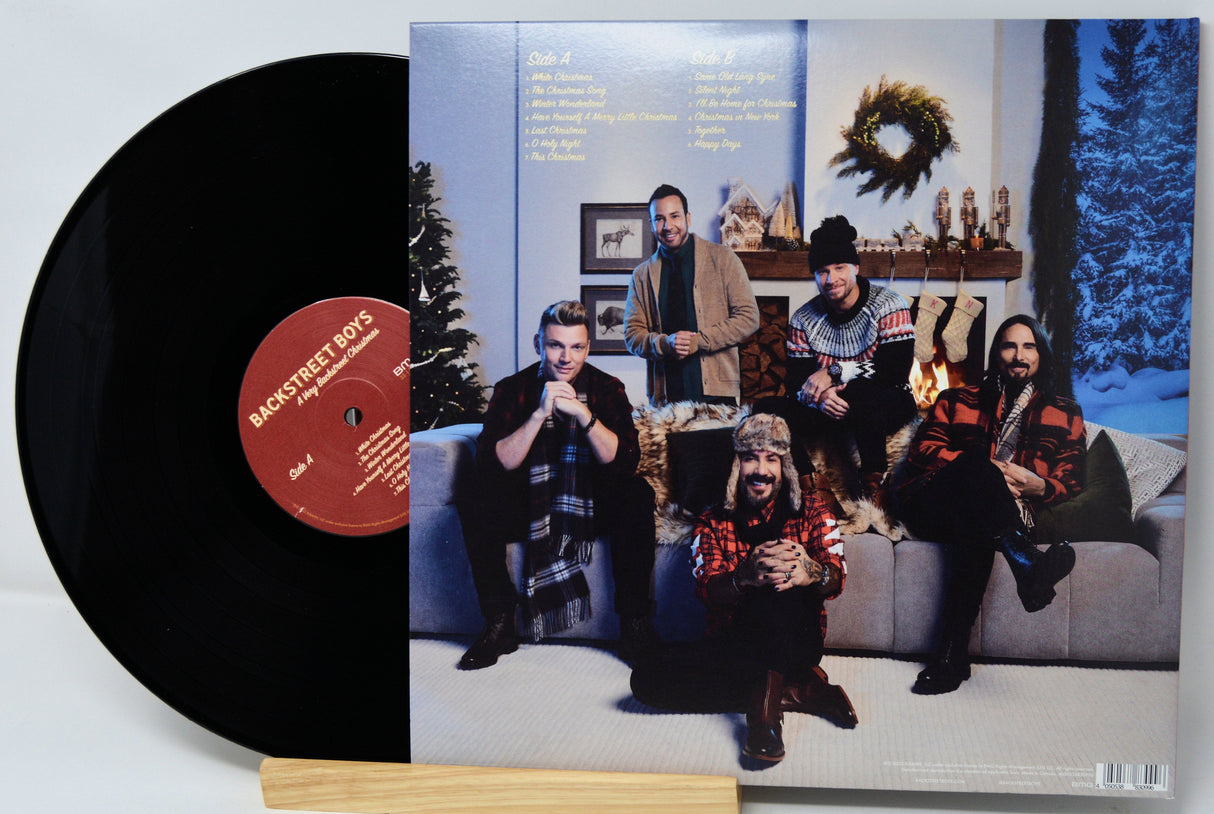 Backstreet Boys A Very Backstreet Christmas vinyl record with band sitting by a fireplace, holiday decor