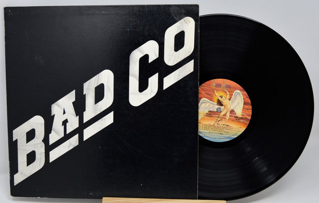 Vinyl record with 'Bad Company' album cover on a white background