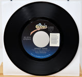 Vinyl record with Epic label on a white background