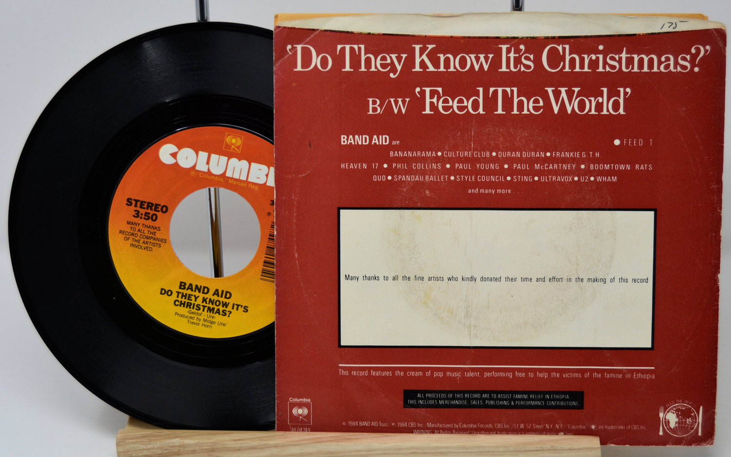 Band Aid 'Do They Know It's Christmas?' 45 RPM single record with red cover