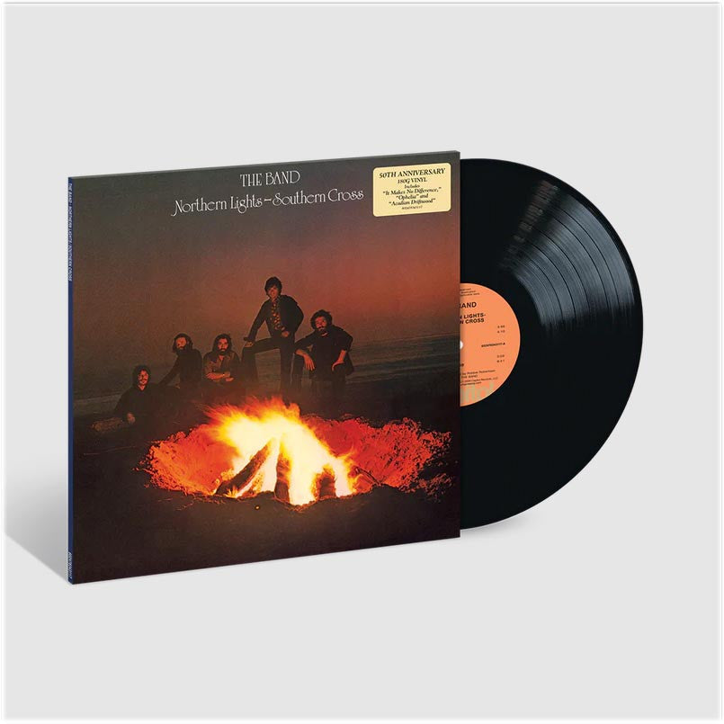 Vinyl record with cover featuring a group of people around a campfire, on a white background.