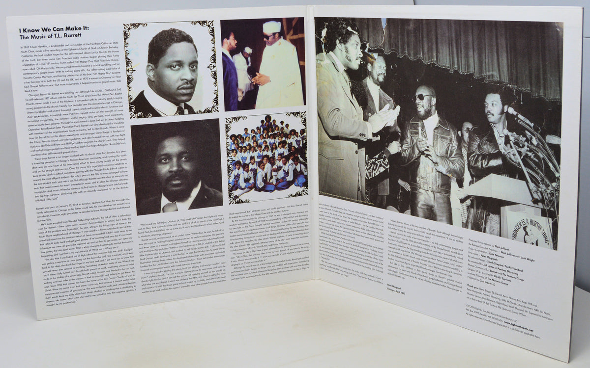 An open printed booklet or magazine spread photographed on a white surface. The pages contain multiple black-and-white photographs, blocks of text, and a few small color photos.