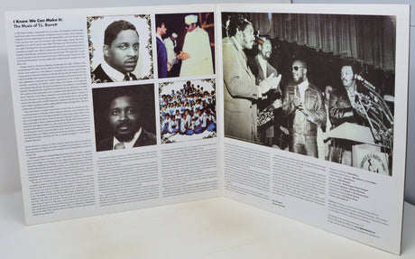 An open printed booklet or magazine spread photographed on a white surface. The pages contain multiple black-and-white photographs, blocks of text, and a few small color photos.