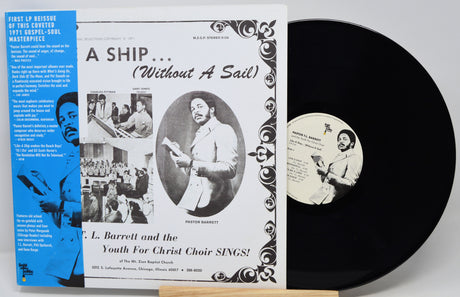A vinyl record album set showing the front cover, inner sleeve, and black record disc on a light gray background. The cover features black-and-white photographs and text including 'A Ship.