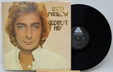 Vinyl record with cover featuring a person and 'Arista' label