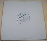 Vintage white sleeve with visible test pressing Basement Boys vinyl partially exposed