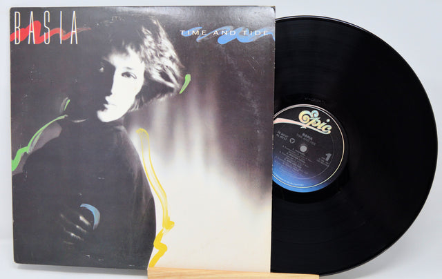 Vinyl record with cover featuring a stylized portrait and 'Cocia' branding.