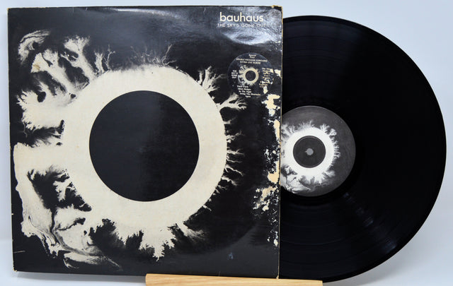 Vinyl record with its cover featuring abstract design and 'bauhaus' branding.