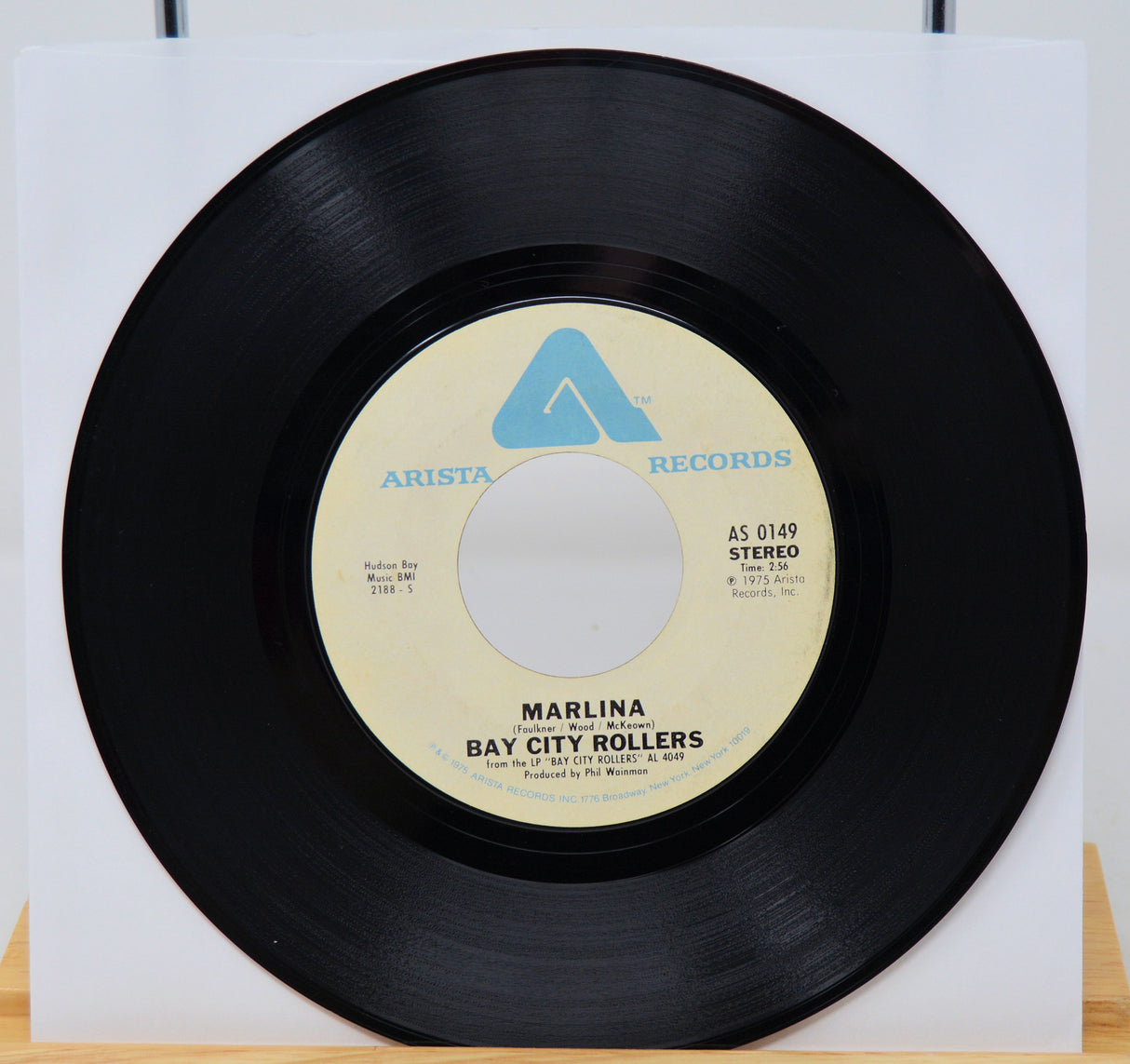 Vinyl record with 'Arista Records' label on a white background