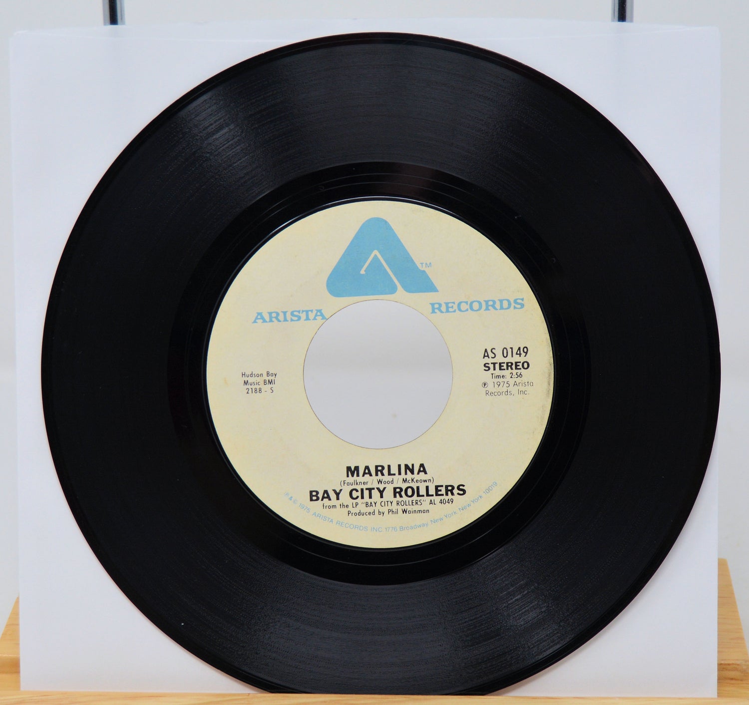 Vinyl record with 'Arista Records' label on a white background